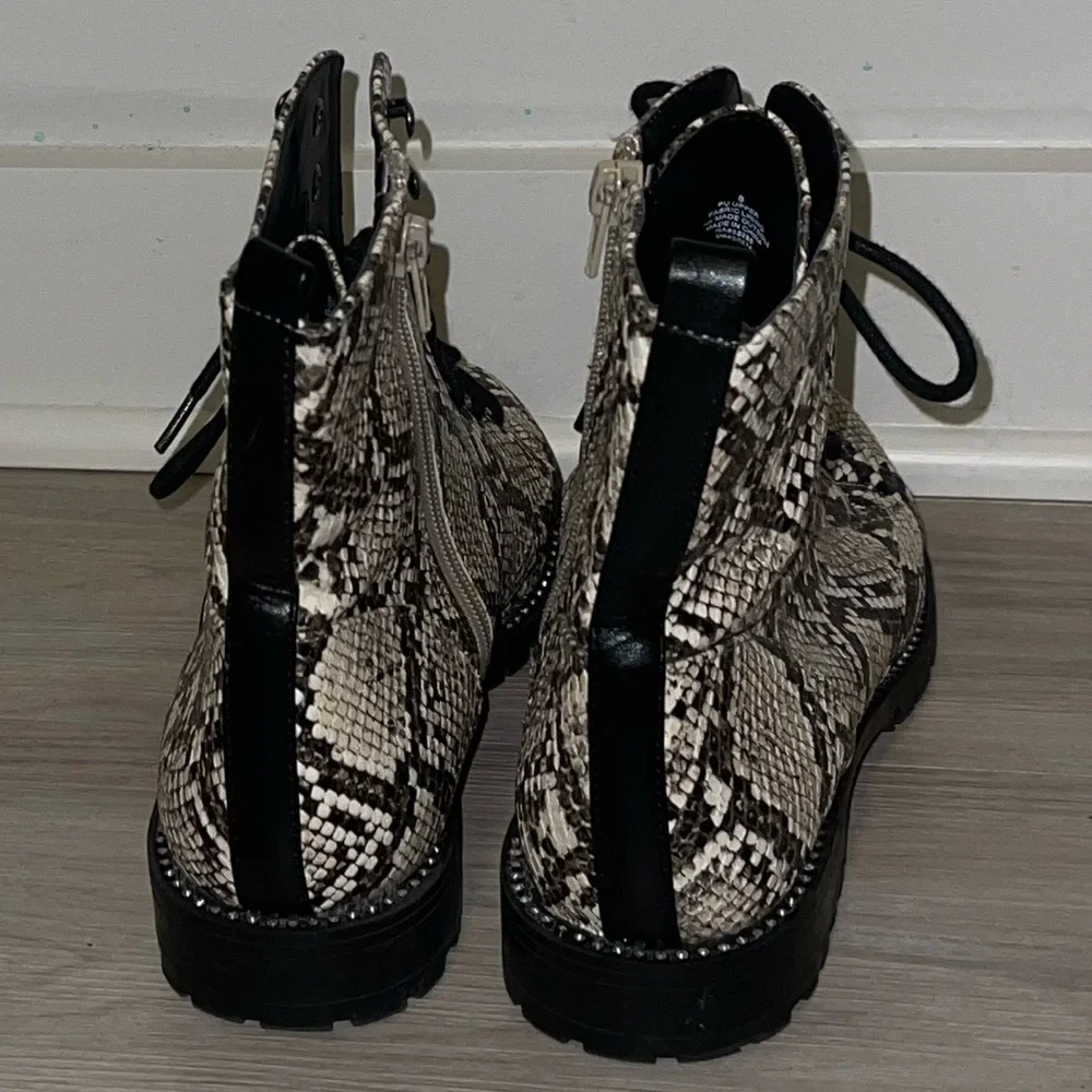 Express snakeskin combat booties. Rhinestone embellishing around sole. - Picture 5 of 10